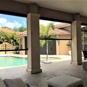 Residential Motorized Outdoor Screen in Pinecrest , FL