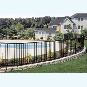 Curved wrought iron pool fence