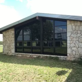 Kerrville's top choice for residential & commercial glass services, including shower doors & enclosures, custom glass table tops & shelving, and mirrors as well as window installation, window repair, re-screening, and commercial glass installation.  Contact us today for more information or to schedule service!