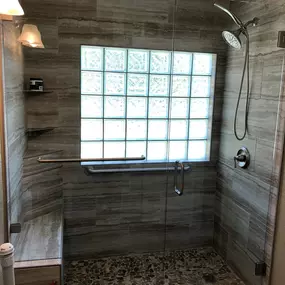 Kerrville's top choice for residential & commercial glass services, including shower doors & enclosures, custom glass table tops & shelving, and mirrors as well as window installation, window repair, re-screening, and commercial glass installation.  Contact us today for more information or to schedule service!