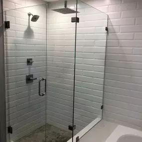 Kerrville's top choice for residential & commercial glass services, including shower doors & enclosures, custom glass table tops & shelving, and mirrors as well as window installation, window repair, re-screening, and commercial glass installation.  Contact us today for more information or to schedule service!