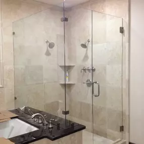 Kerrville's top choice for residential & commercial glass services, including shower doors & enclosures, custom glass table tops & shelving, and mirrors as well as window installation, window repair, re-screening, and commercial glass installation.  Contact us today for more information or to schedule service!