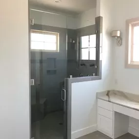 Kerrville's top choice for residential & commercial glass services, including shower doors & enclosures, custom glass table tops & shelving, and mirrors as well as window installation, window repair, re-screening, and commercial glass installation.  Contact us today for more information or to schedule service!