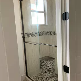 Kerrville's top choice for residential & commercial glass services, including shower doors & enclosures, custom glass table tops & shelving, and mirrors as well as window installation, window repair, re-screening, and commercial glass installation.  Contact us today for more information or to schedule service!