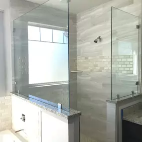 Kerrville's top choice for residential & commercial glass services, including shower doors & enclosures, custom glass table tops & shelving, and mirrors as well as window installation, window repair, re-screening, and commercial glass installation.  Contact us today for more information or to schedule service!