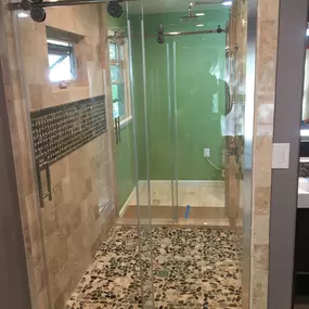 Kerrville's top choice for residential & commercial glass services, including shower doors & enclosures, custom glass table tops & shelving, and mirrors as well as window installation, window repair, re-screening, and commercial glass installation.  Contact us today for more information or to schedule service!