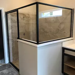 Kerrville's top choice for residential & commercial glass services, including shower doors & enclosures, custom glass table tops & shelving, and mirrors as well as window installation, window repair, re-screening, and commercial glass installation.  Contact us today for more information or to schedule service!