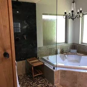 Kerrville's top choice for residential & commercial glass services, including shower doors & enclosures, custom glass table tops & shelving, and mirrors as well as window installation, window repair, re-screening, and commercial glass installation.  Contact us today for more information or to schedule service!