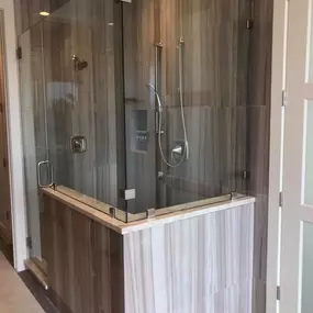 Kerrville's top choice for residential & commercial glass services, including shower doors & enclosures, custom glass table tops & shelving, and mirrors as well as window installation, window repair, re-screening, and commercial glass installation.  Contact us today for more information or to schedule service!