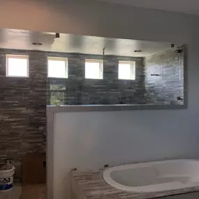 Kerrville's top choice for residential & commercial glass services, including shower doors & enclosures, custom glass table tops & shelving, and mirrors as well as window installation, window repair, re-screening, and commercial glass installation.  Contact us today for more information or to schedule service!