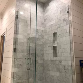 Kerrville's top choice for residential & commercial glass services, including shower doors & enclosures, custom glass table tops & shelving, and mirrors as well as window installation, window repair, re-screening, and commercial glass installation.  Contact us today for more information or to schedule service!