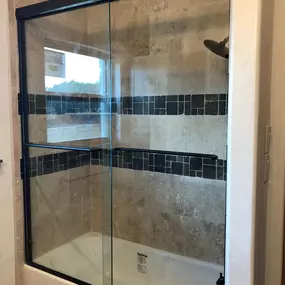 Kerrville's top choice for residential & commercial glass services, including shower doors & enclosures, custom glass table tops & shelving, and mirrors as well as window installation, window repair, re-screening, and commercial glass installation.  Contact us today for more information or to schedule service!