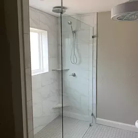 Kerrville's top choice for residential & commercial glass services, including shower doors & enclosures, custom glass table tops & shelving, and mirrors as well as window installation, window repair, re-screening, and commercial glass installation.  Contact us today for more information or to schedule service!