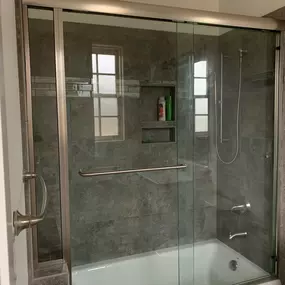 Kerrville's top choice for residential & commercial glass services, including shower doors & enclosures, custom glass table tops & shelving, and mirrors as well as window installation, window repair, re-screening, and commercial glass installation.  Contact us today for more information or to schedule service!