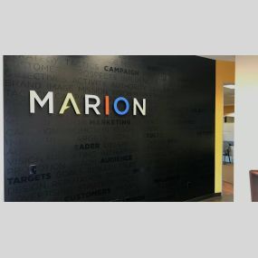 Picture of logo wall at MARION marketing agency in Houston, TX