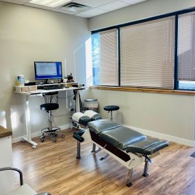 Dr. Chris moved his space back up to the front of the office for a bigger, more spacious adjusting area.