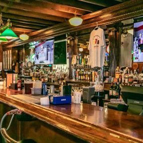 Visit our sports bar for happy hour!