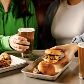 happy hour with beer, wings, and sliders