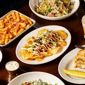 tuna poke nachos, patty melt, loaded fries, pineapple margarita