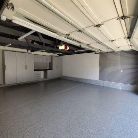 Custom Cabinets, epoxy flooring by Premier Garage