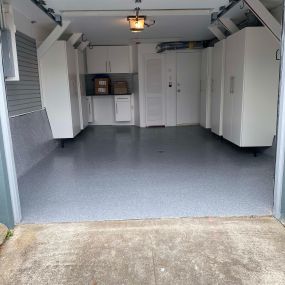 White Cabs, epoxy flooring & slatwall - Premier Garage of the Bay Area