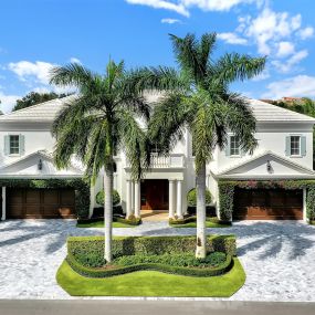 This is an architecturally significant custom home in Royal Palm Yacht and Country Club built by ACG and JP DiMisa.