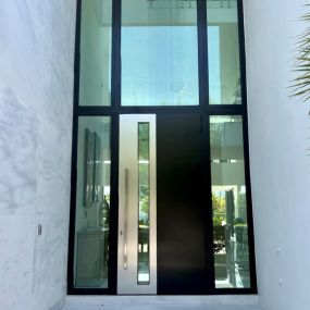 ACG installed impact-resistant windows, contemporary doors, and glass railings in this incredible modern home.