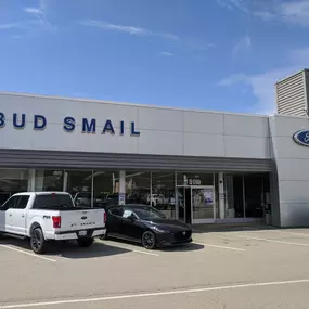 Bud Smail Ford/Lincoln Located in east Greensburg, Pa just minutes from Westmoreland Mall and Arnold Palmer Reginal Airport.  We are conveniently located just a short drive from Irwin, North Huntingdon, Monroeville, and Pittsburgh. Stop in and see our large selection of new and used cars