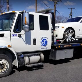 Double J Towing & Transport in Bowie, Maryland 
(240) 286-1494
http://doublejtowing.com/
- Flatbed towing 
- Luxury vehicle transport