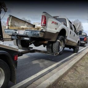 Double J Towing & Transport in Bowie, Maryland 
(240) 286-1494
http://doublejtowing.com/
- Roadside Assistance