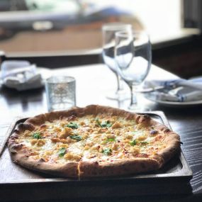 White Clam Wood-fired Pizza
bechemel, local littlenecks, fresh herbs, roasted garlic, pecorino, fontina