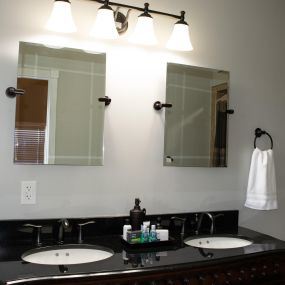 Ravishing House Bathroom with double sinks and mirrors