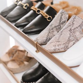 Shoe racks are a great way to store shoes for visual appeal and ease of finding.