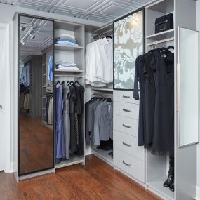 Luxe closet features multiple storage options.