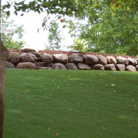 Not only do retaining walls create an attractive area for patios or gardens, they can also help reclaim unusable areas of your property or construct level areas for patios, decks, pools or structures. Let the leading experts at Greenscape Companies help you with your retaining wall needs.