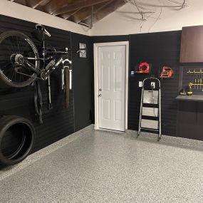In addition to your custom cabinets and epoxy floor, PremierGarage can add final touches such as horizontal bike racks, wire baskets, and tire hooks to your custom design.