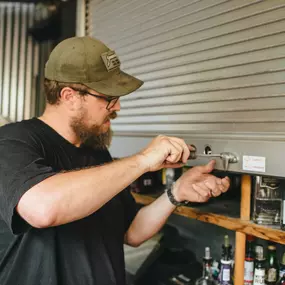 One of our technicians opening up a shed.