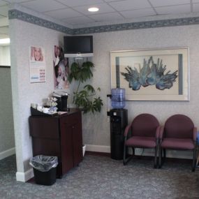 Our waiting room. Fill out your paperwork while you watch TV. Enjoy free water and coffee.
