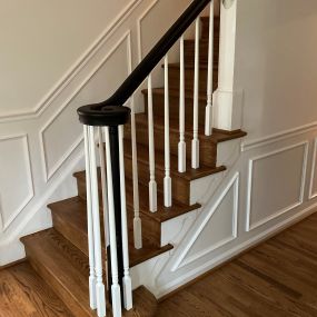 This is a new handrail, newel post and balusters we installed in Fairfax, Va. Note that the handrail was stained a contrasting color.