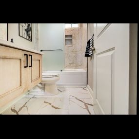 A floating vanity made a small bathroom in Leland look larger.