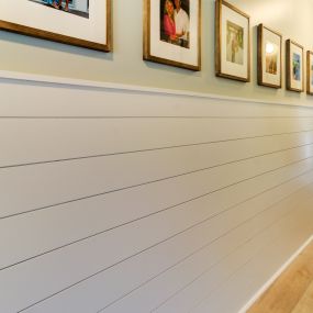 Shiplap wainscotting adds a nice touch to an entry hallway in Carolina Beach