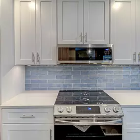 White Shaker Kitchen with low profile microwave