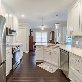 Showplace White Shaker Kitchen with Blue 3x12 backsplash