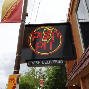 Ames entrance and Pizza Pit Sign