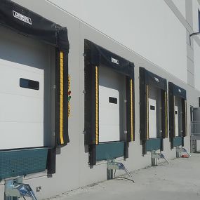 We can assist with commercial garage doors by meeting a variety of loading dock requirements.