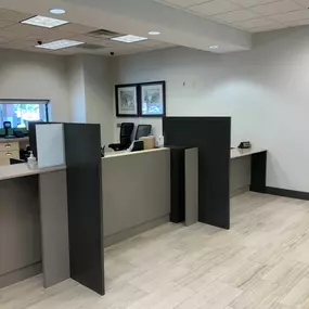 This professional bank reception area was meticulously cleaned by Dallas Janitorial Services, featuring sanitized teller counters and spotless partition screens. The space showcases our attention to detail in financial institutions where cleanliness conveys security and professionalism.