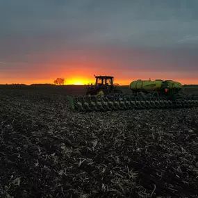 John Deere Tractor In a Field