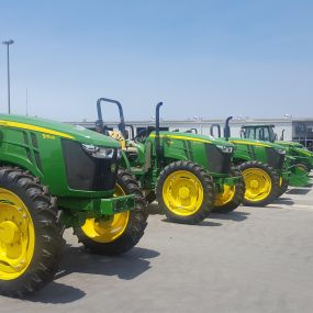 Row of John Deere specialty tractors at RDO Equipment Co. in Watsonville, CA