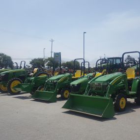 Row of John Deere utility tractors at RDO Equipment Co. in Watsonville, CA