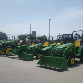 Row of John Deere utility tractors at RDO Equipment Co. in Watsonville, CA